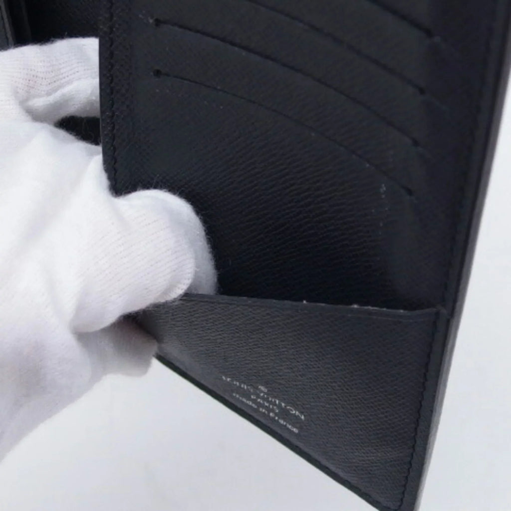 Pre-Owned Louis Vuitton Taiga Bifold Long Wallet Billfold Black (Good)