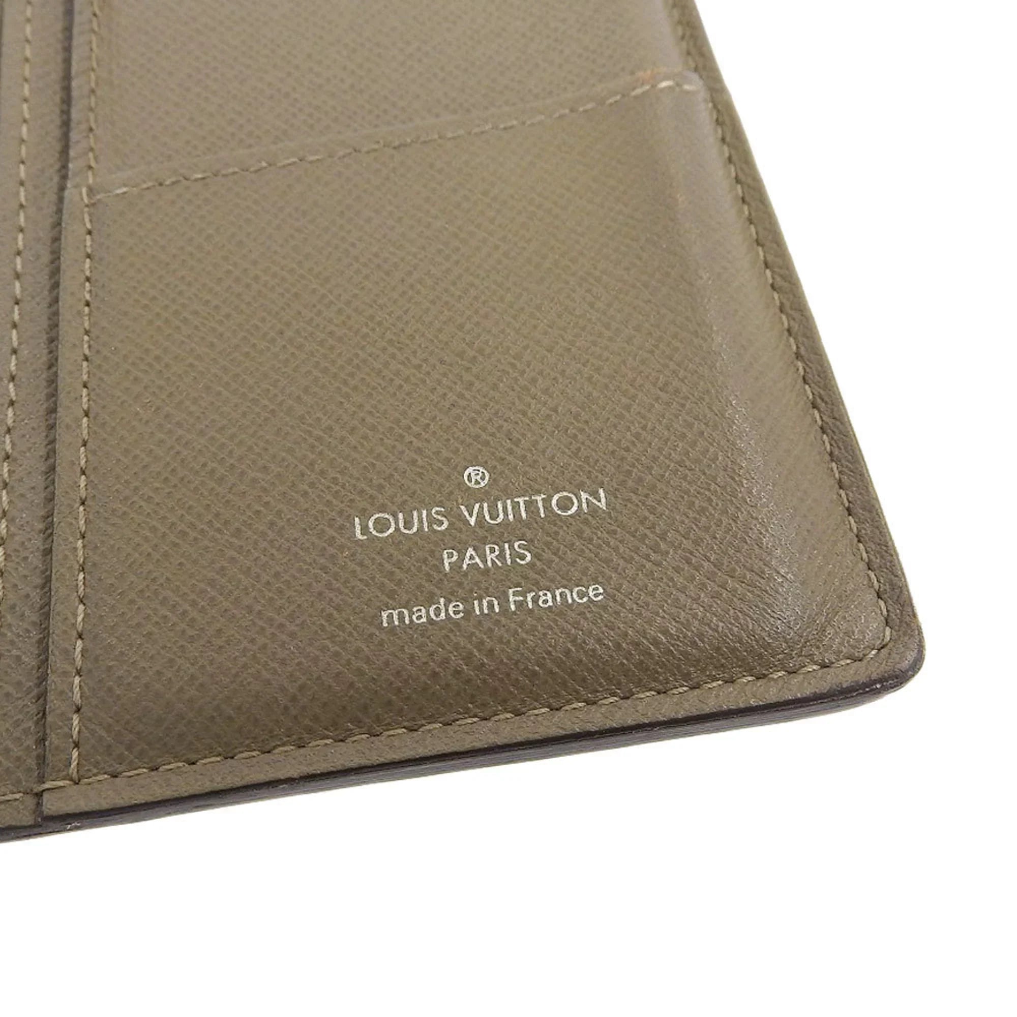 Pre-Owned Louis Vuitton   Taiga Portefeuille Brother Bifold Long Wallet Ural  (Good)